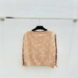 南油高版本2025年秋冬新款套头重工羽毛水钻亮片高级感针织毛衣女