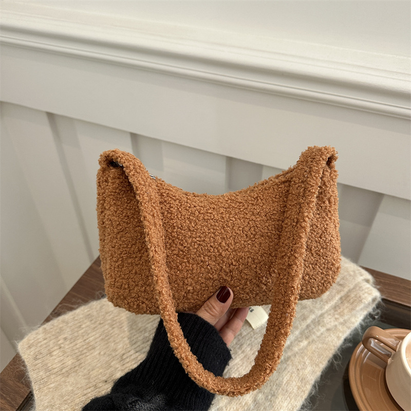 2025 primavera nueva granular cordero hombro brazo bolso de estilo coreano minimalista bolso de mujer bolso de peluche lindo mochila