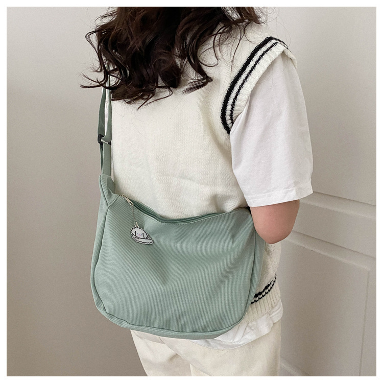Large capacity canvas shoulder for women in spring summer 2023, new solid color, simple and fashionable casual bag,_voghion.com