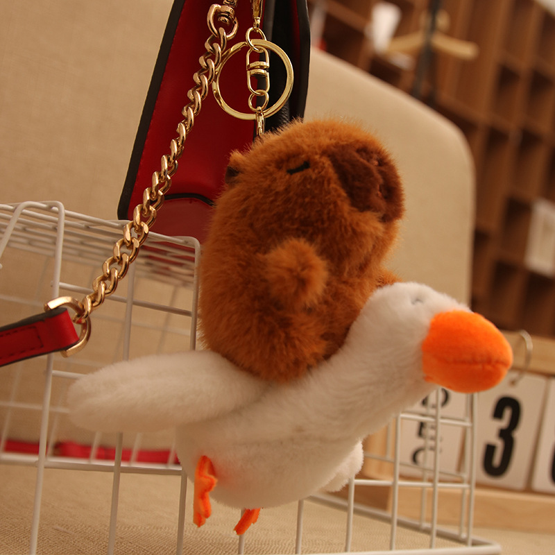 Nueva línea de tracción Kapibala muñeca peluche cachorro capibara gran ganso Kapibala muñeca bolso colgante