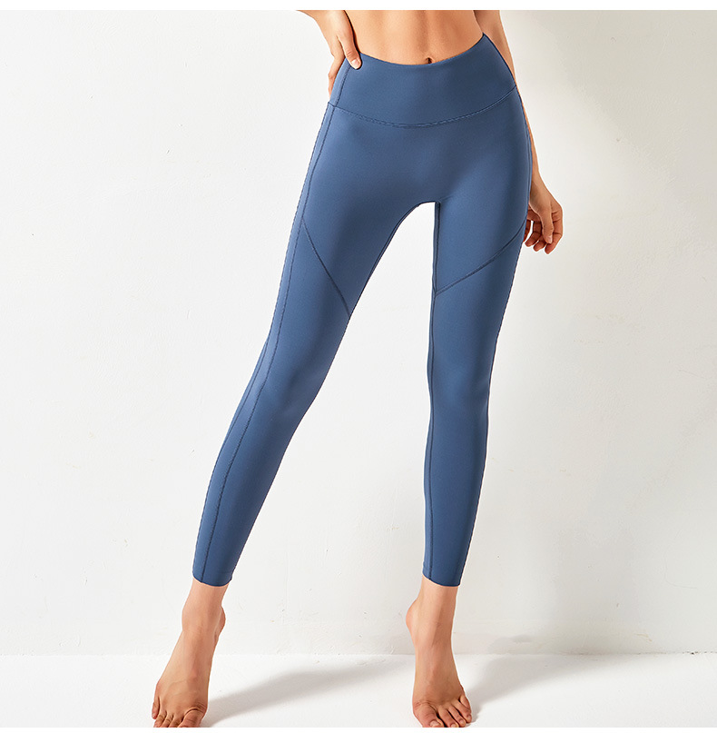 Pantalones de yoga de color sólido con bolsillos de cintura alta y cintura alta que levantan la cadera NSYWH127911