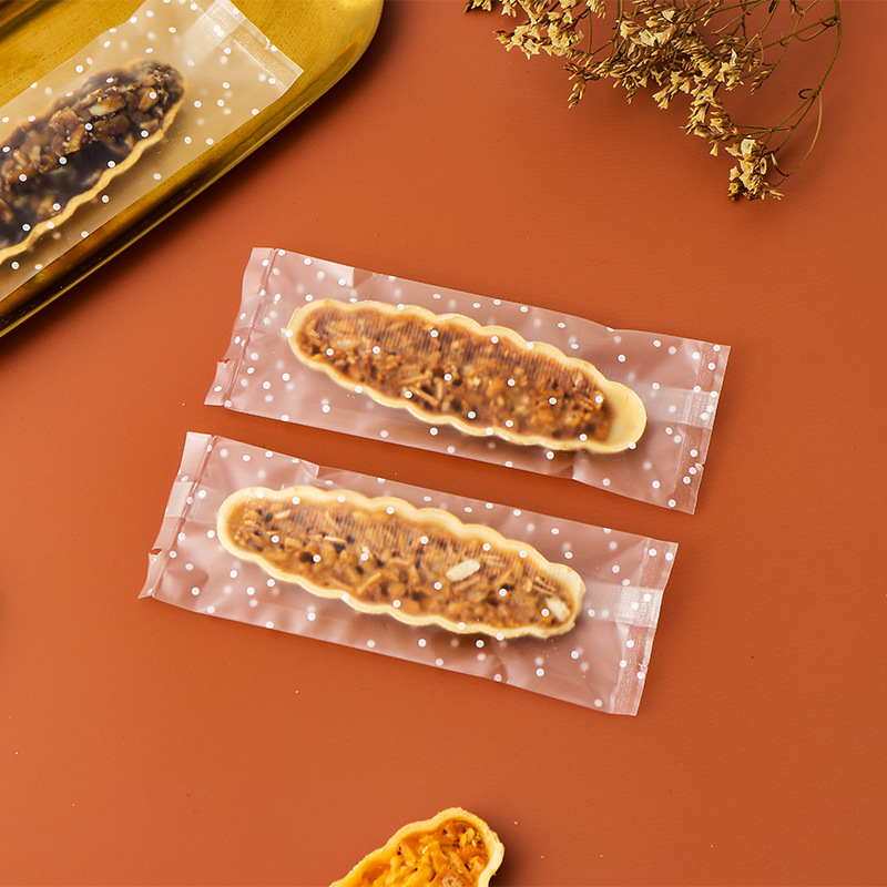 Clásico tipo barco de arroz glutinoso embalaje rectangular máquina de hornear bolsa de sellado en stock fábrica al por mayor bolsa de embalaje de piruletas