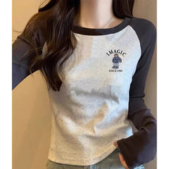 色の肩の袖のねじの綿の短い上着C長袖のtシャツのアルファベットのプリントは弾力性の小さい背にフィットします。