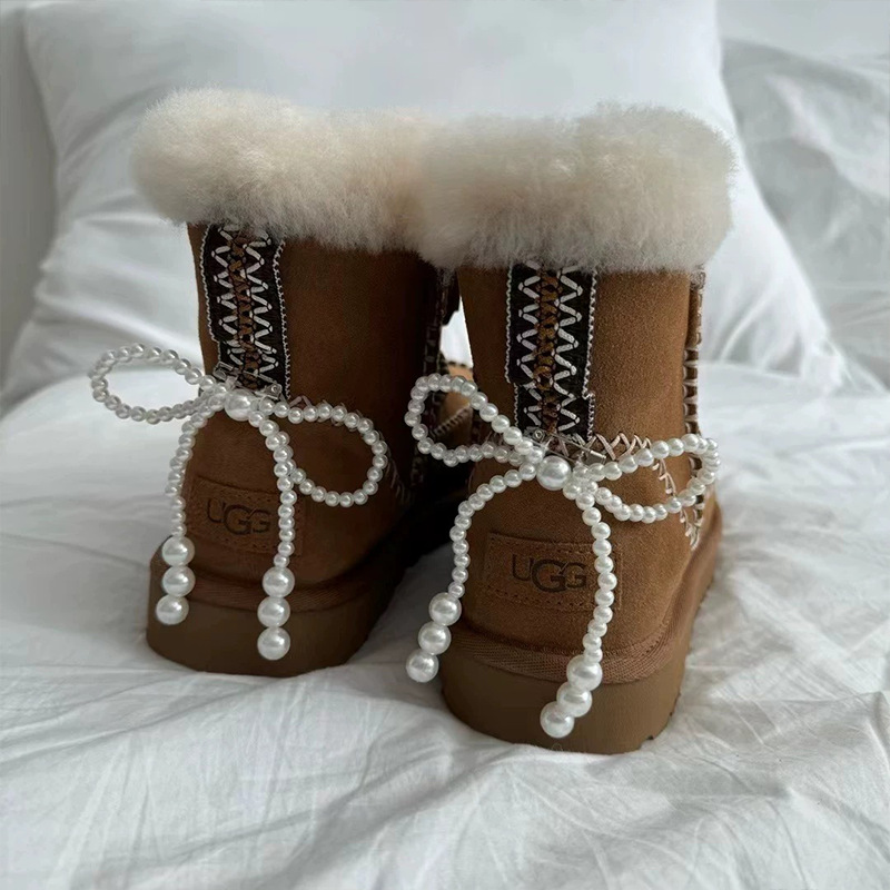 Botas de nieve botón de invierno nuevo arco de perlas zapatos de fichaje flor zapatos deportivos decoración mujer