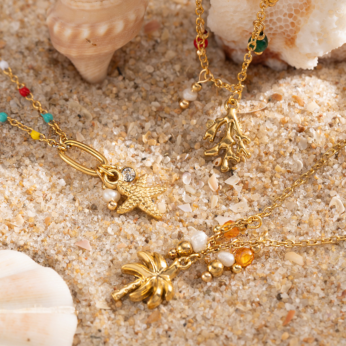 Tena Pulsera de acero inoxidable europea y americana Sensación simple y de alto nivel Estilo de playa Coconut Estrella de mar Pulsera de aceite de gota Lujo ligero Chica de nicho