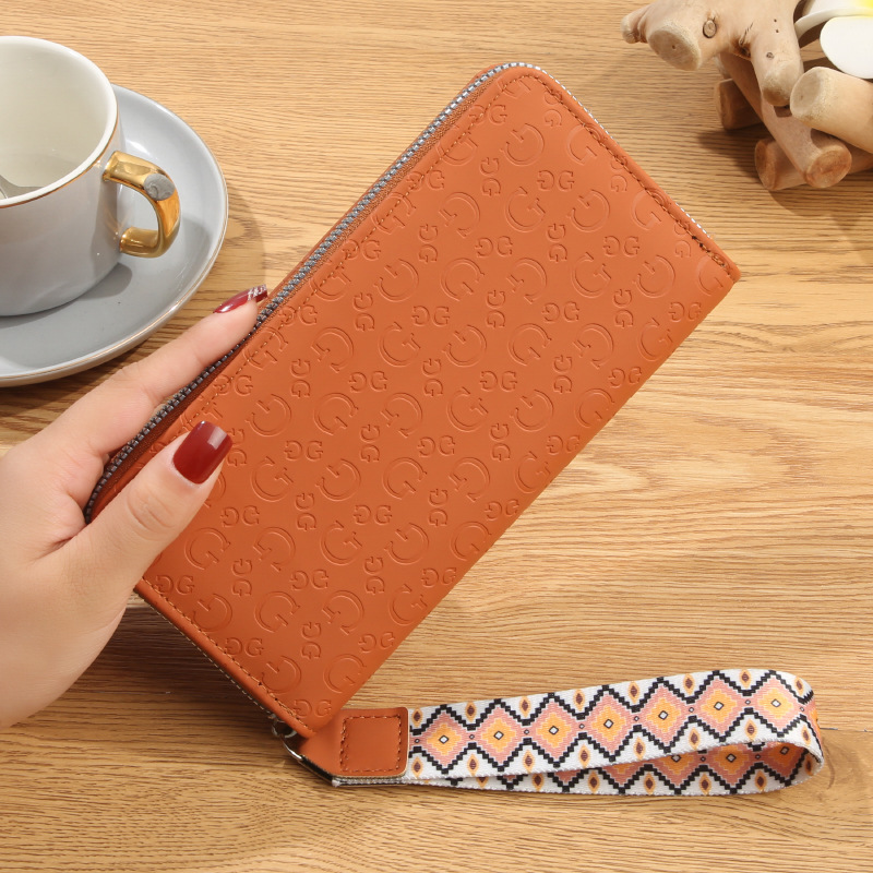 Bag women's 2025 spring new PU leather trend fashion simple printing hand purse wholesale bags tide