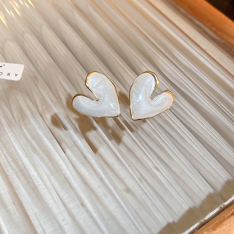 Aguja de plata flor pendientes geométricos pendientes dulces pequeños frescos de Corea del Sur ins moda nicho pendientes