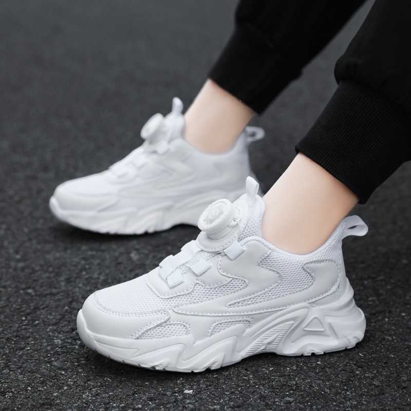 Zapatos blancos para niños ventilados primavera-verano 2026 nuevos zapatos blancos para niños botones giratorios de zapatos blancos para niñas