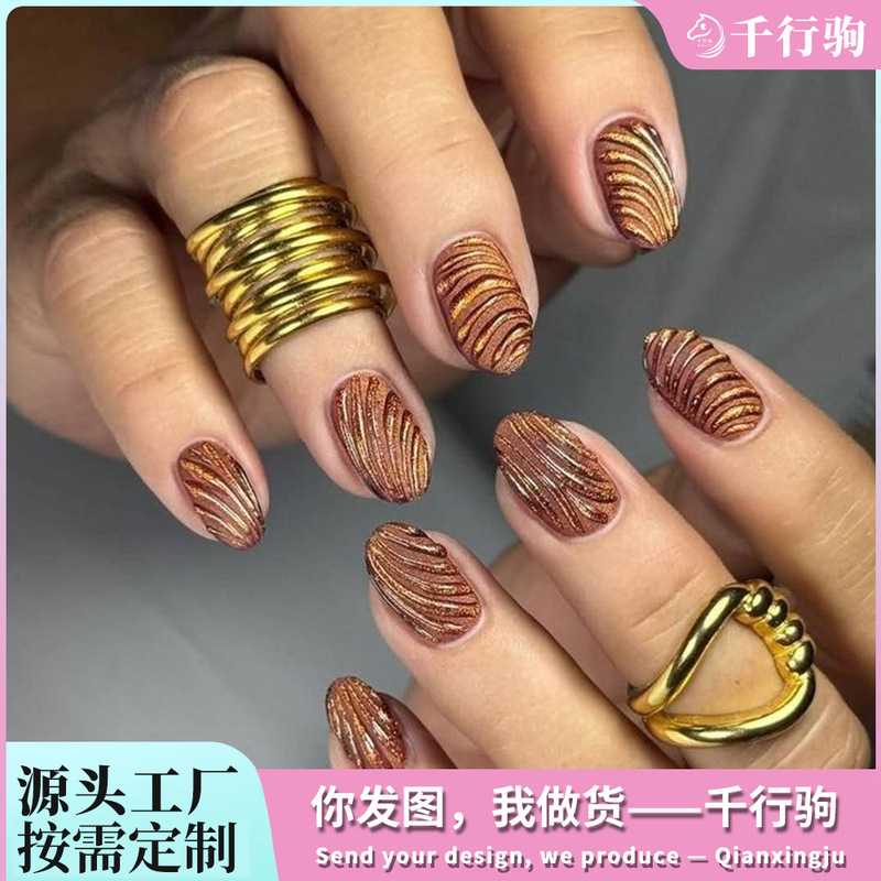 Customized 30-piece wearable nail art set with Maillard 3D embossed glitter swirl texture oval-shaped wearable nails