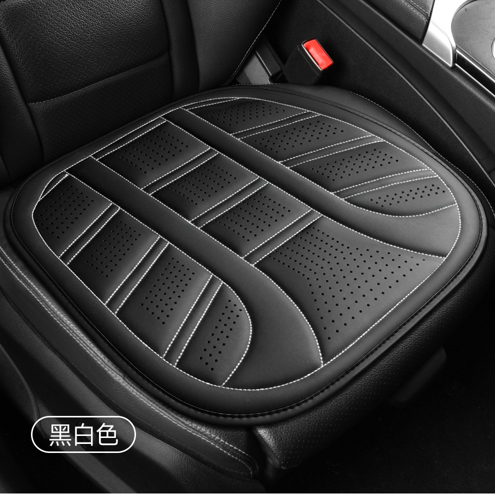 26 Wholesale of all-season car seat cushions for export, featuring perforated leather for breathability, comfort, and a simple, square design