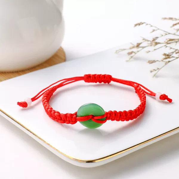 Red rope bracelet, green protective amulet, buckle