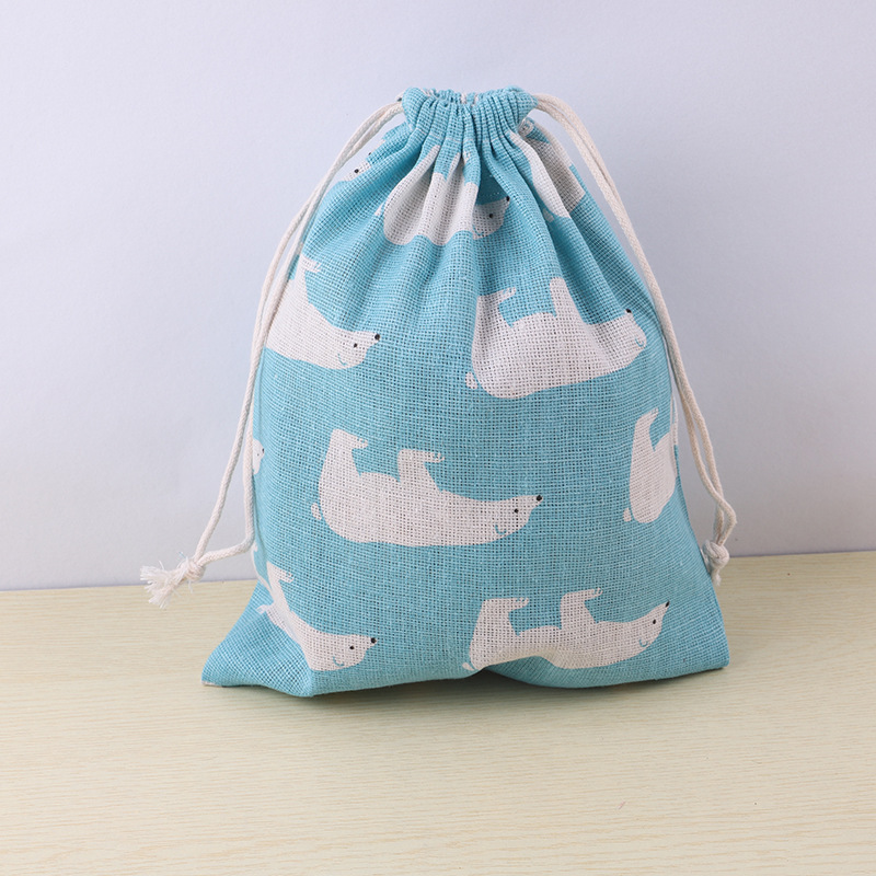 Fábrica en stock patrón creativo impreso algodón de mano cordón bolsa cordón regalo impresión cordón bolsa de almacenamiento al por mayor