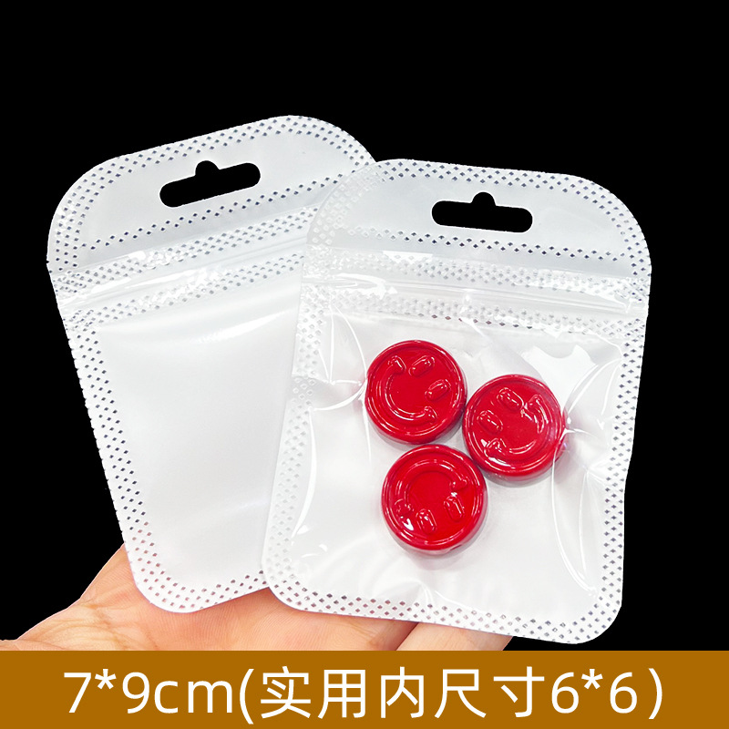 正方形のセルフシール包装袋現物両面透明ゴム袋四角い袋白いセルフシール袋大珠光袋