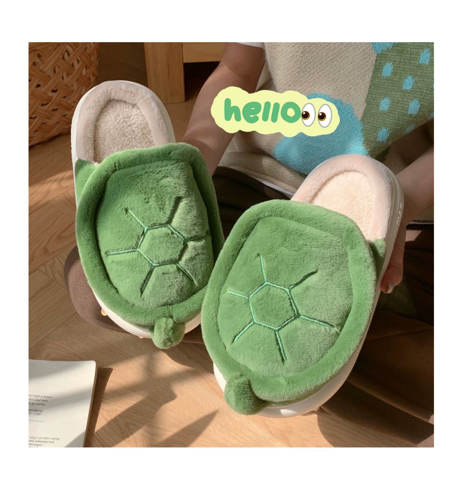 Green turtle-shaped slippers from a close angle