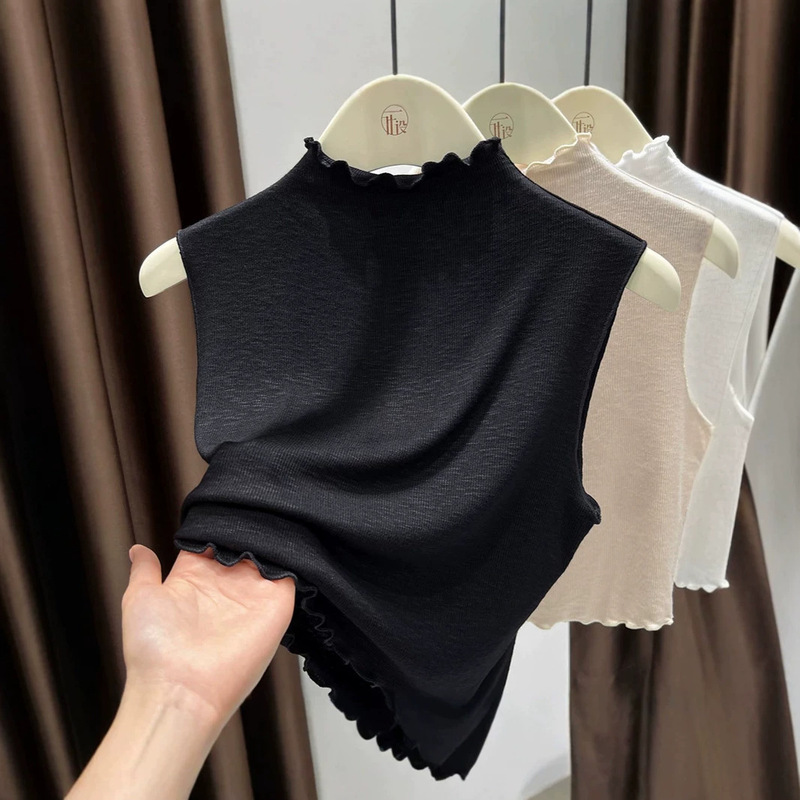 Slim-fit ruffled half-high collar knitted vest, suitable for layering or wearing alone, faux collar, short sleeveless women's top Slim-fit ruffled half-high collar knitted vest, suitable for layering or wearing alone, faux collar, short sleeveless women's top
