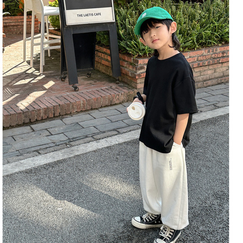 Children's short-sleeved solid color summer round neck t-shirt 100% cotton short-sleeved boys and girls loose western style t-shirt factory price