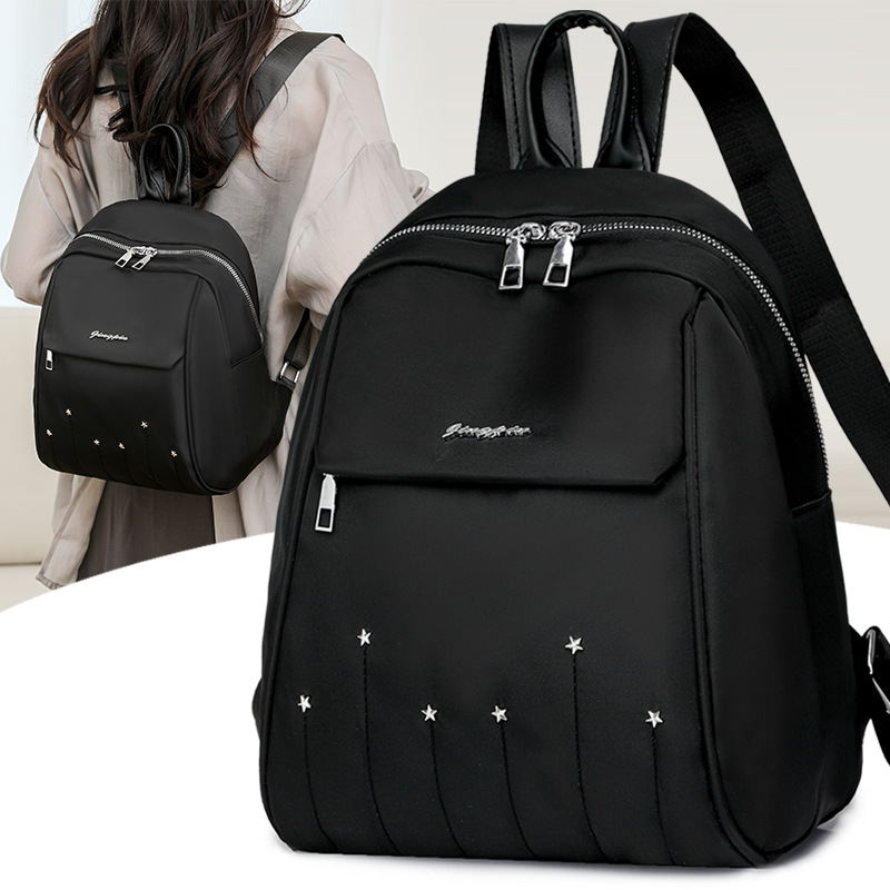 Mochila para mujer 2024 nueva mochila pequeña de nailon de moda de color sólido de alta gama mochila ligera para mujer