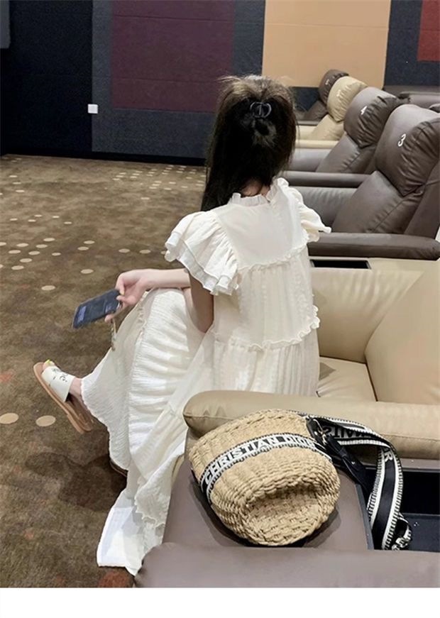 Đầm nữ tay phồng nhẹ suông rộng dáng midi phong cách ngọt ngào xuân hè 2026 — Màu hạnh nhạt chi tiết 5