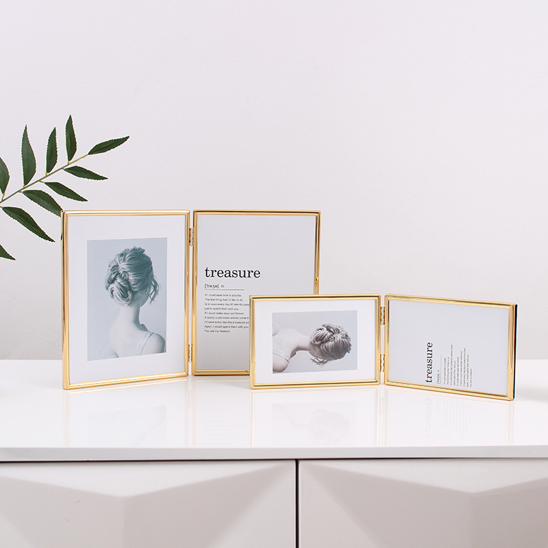 Dawei simple ins style modern exquisite double-sided folding gold horizontal and vertical 67810 inch metal photo frame table Dawei simple ins style modern exquisite double-sided folding gold horizontal and vertical 67810 inch metal photo frame table