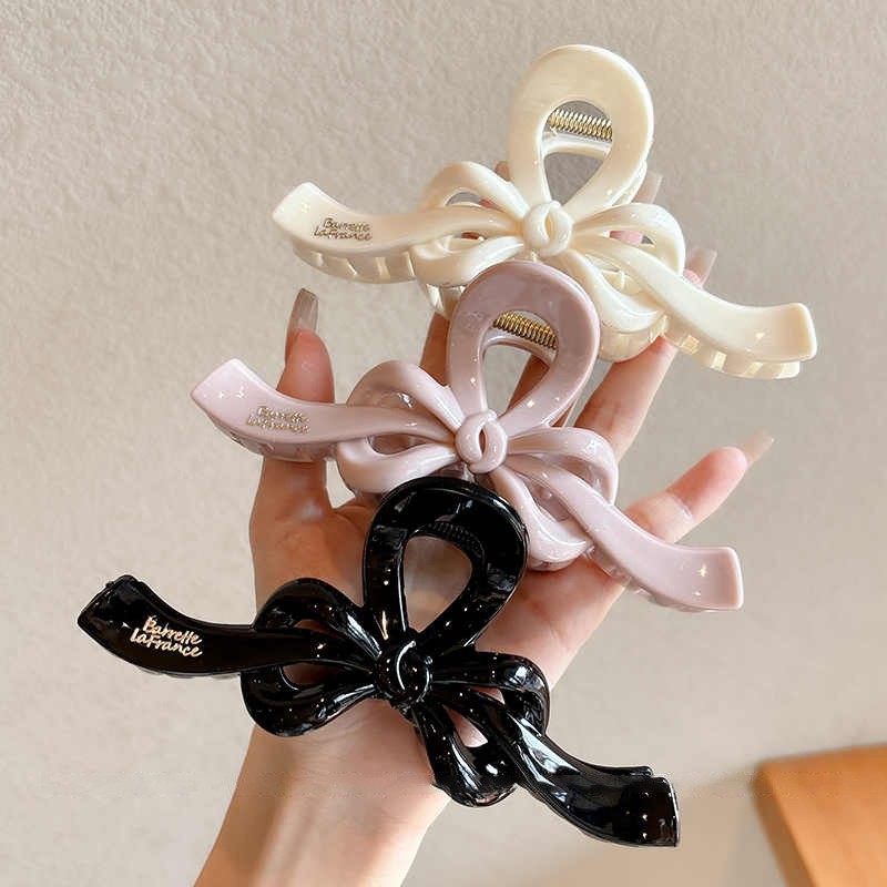 Temperamento arco flotante clip para el cabello de mujer cantidad de diseño de clip de tiburón tarjeta de cabello detrás de la cabeza agarrar clip para el cabello