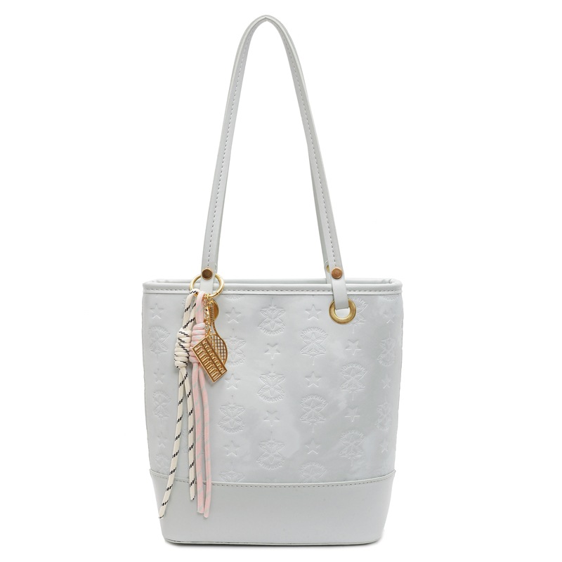 Bolsa de cubo de moda coreana para mujeres 2025, nuevo diseño universal de nicho para viajar bolso de hombro de moda bolso de mujer casual