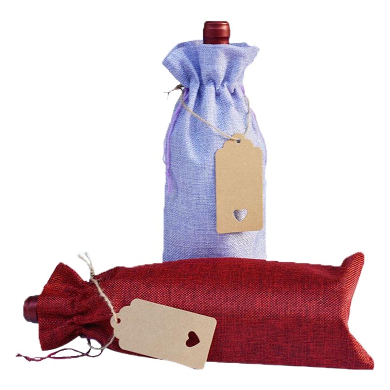Bolsa de lino en stock venta al por mayor de alta gama champán bolsa de embalaje de vino cordón a prueba de polvo bolsa de botella de vino traje