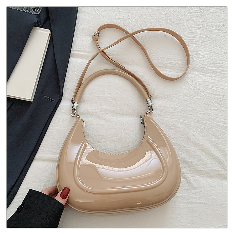 Bolso de luna nueva portátil de alta calidad bolso de mujer 2025 transfronterizo sudeste asiático nuevo estilo color gelatina bolso de mensajero de lujo ligero