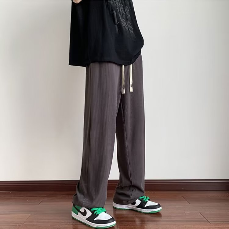 Verano delgado hombre 2026 nueva tendencia confortable pull-out pantalones largos de piernas largas pantalones de chicos rectos sueltos