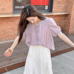 紫の優しさは半袖の気質のシャツの女性の2025夏の新型はやせているシャツの独特な超美しい上着の潮を現します。