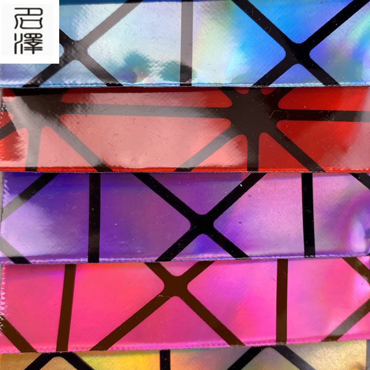 厂家现货批发0.7mm毛底 加胶 镭射PU人造革适用于箱包手袋装饰