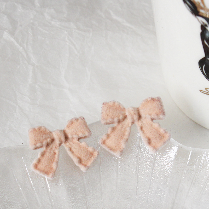 Autumn and winter new cute flocking bow womenu0027s alloy earrings