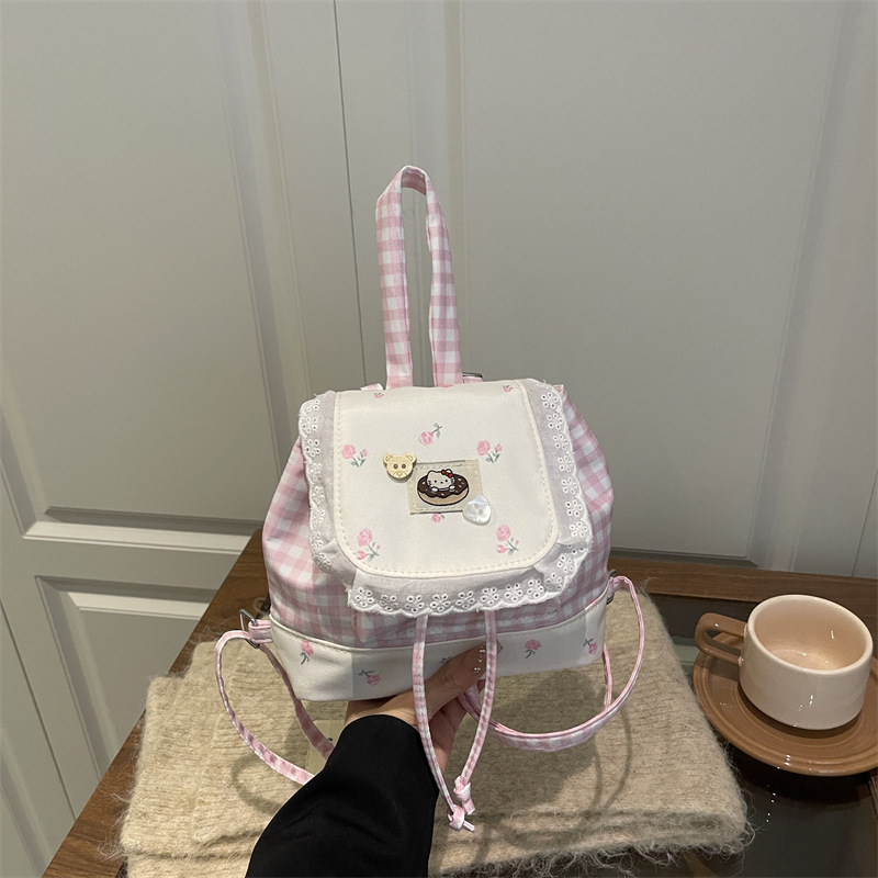 Japón dulce puro deseo mochila de encaje 2025 nueva chica coreana encantadora viaje flor pegatinas mochila pequeña