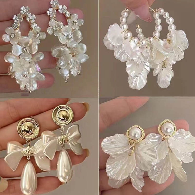 Pendientes de perlas con borla de flores de alta calidad con aguja de plata Pendientes de todo fósforo de moda francesa de nuevo estilo Pendientes de alta calidad de lujo ligero