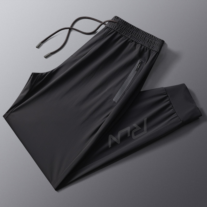 Pantalones deportivos de seda de hielo para hombres de verano delgados aire acondicionado pie suelto secado rápido respirado pantalones de entrenamiento de nueve puntos