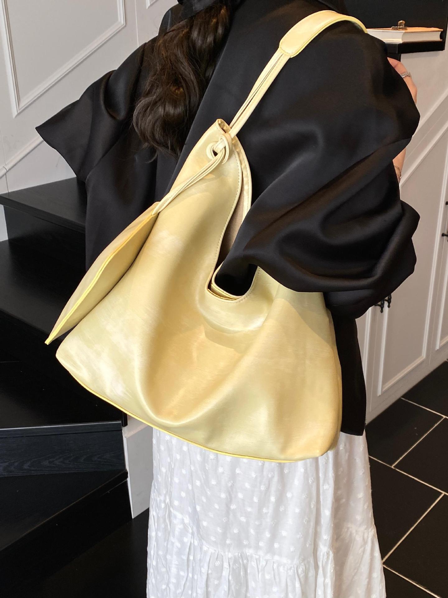Nuevos productos transfronterizos más vendidos Bolso de cuero suave para axilas para mujer 2025 Modelo súper caliente Bolso de hombro de gran capacidad de viento perezoso