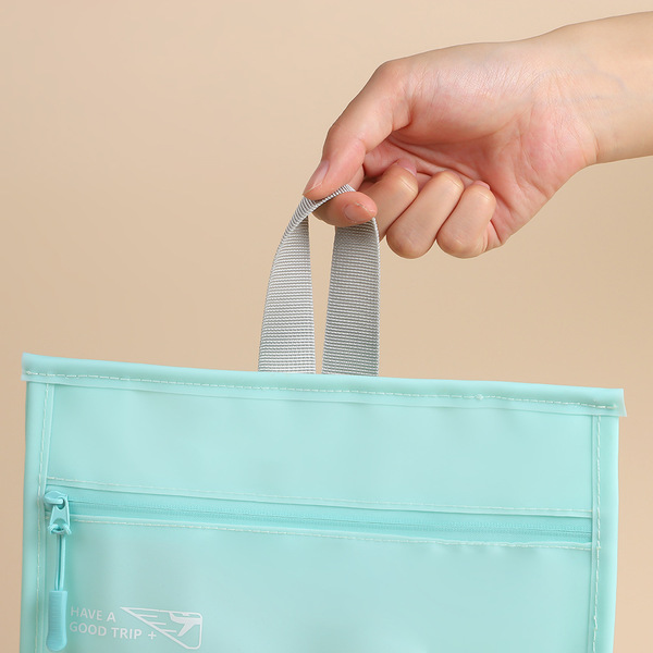 Handheld capacious waterproof cosmetic bag to go out for traveling