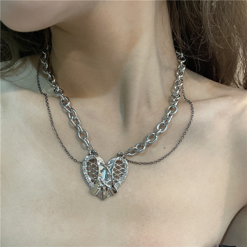 Wholesale Collier À Double Gland En Acier Titane Coeur Creux Nihaojewelry display picture 5