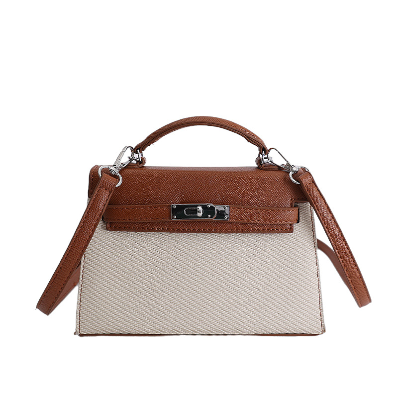 Textura de nicho bolso de diseño de mujer 2026 nuevo bolso Kylie color contraste diario simple viaje mochila de hombro