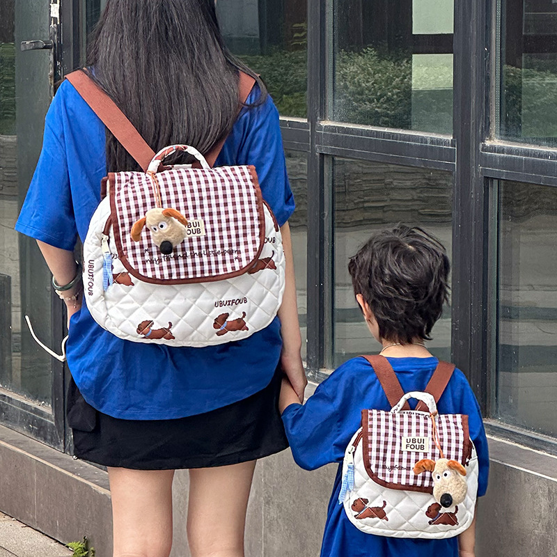 Escuela de jardín de infantes Escuela de escuela primaria Mochila de dibujos animados lindo cachorro para padres e hijos 2025 Nuevo estilo con colgante Mochila para niños