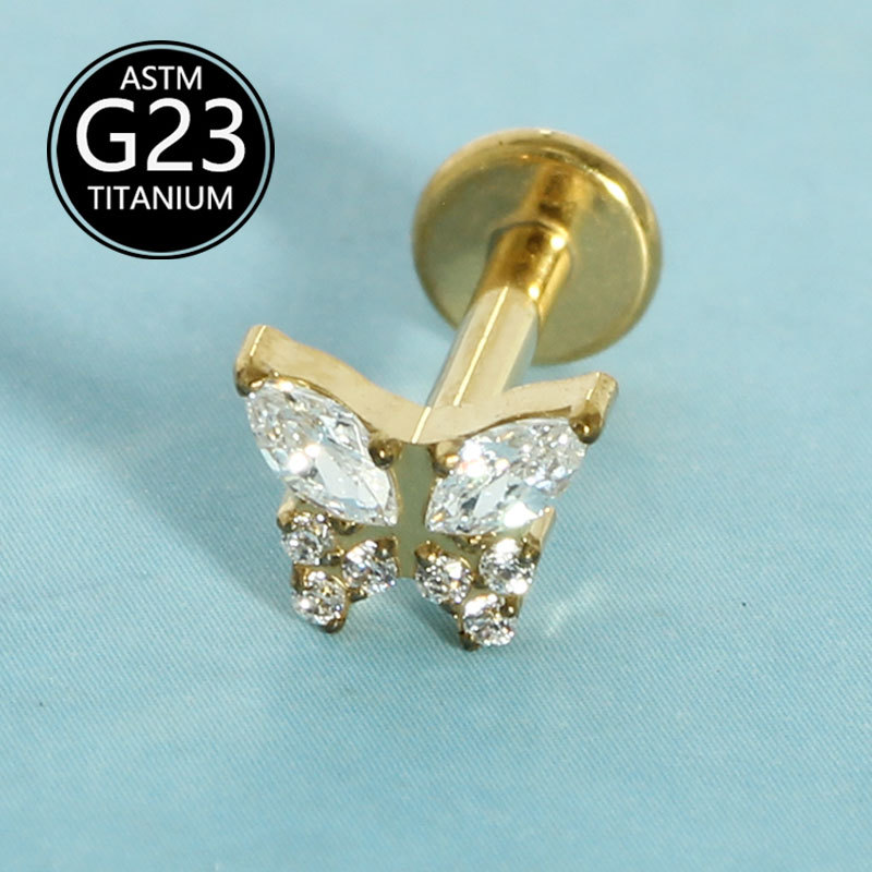 Silver pointed spike labret stud material detail