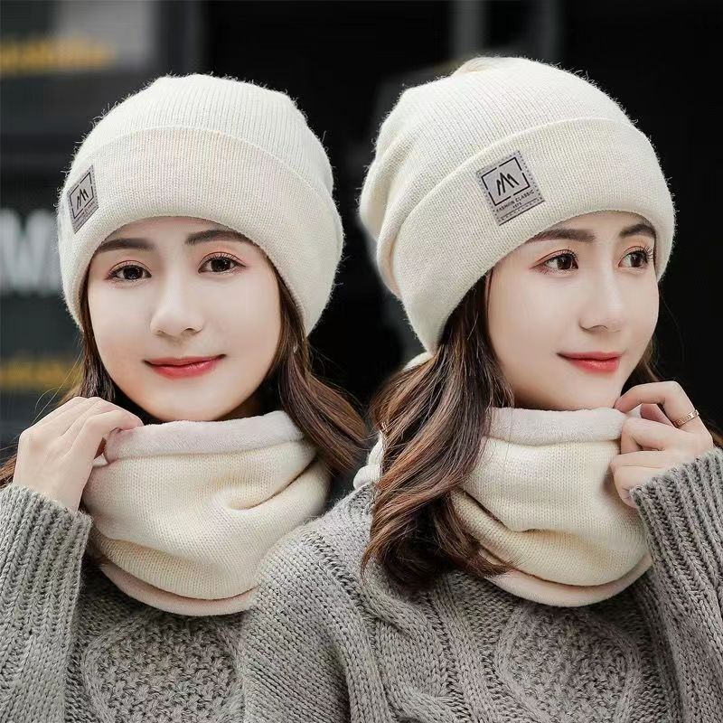 Hat winter keep warm Autumn and winter lady Versatile Wool cap Plush Knitted hat Korean Edition Ride a bike Ear cap