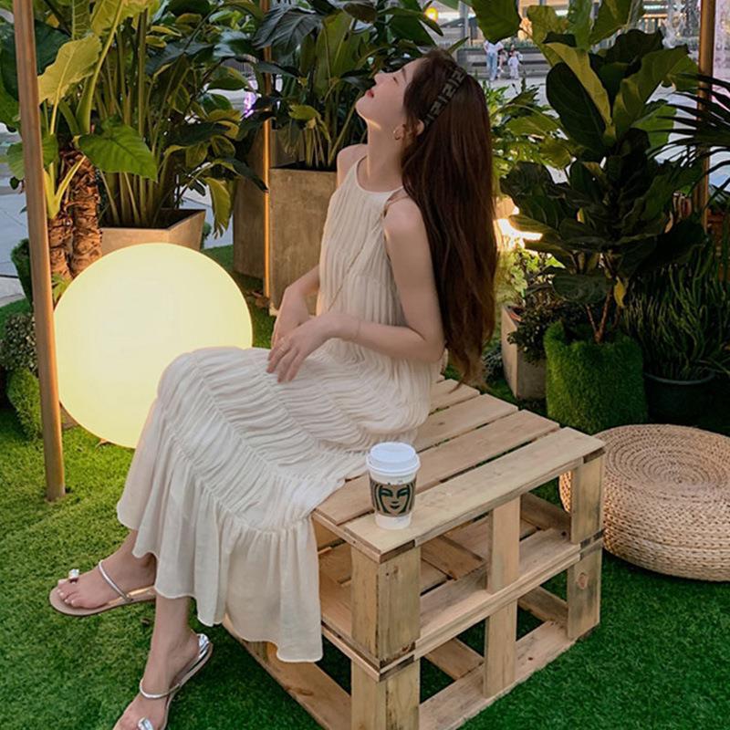 Commuter summer new light luxury Sanya Seaside sling dress South Korea elegant slimming beach dress western style Commuter summer new light luxury Sanya Seaside sling dress South Korea elegant slimming beach dress western style