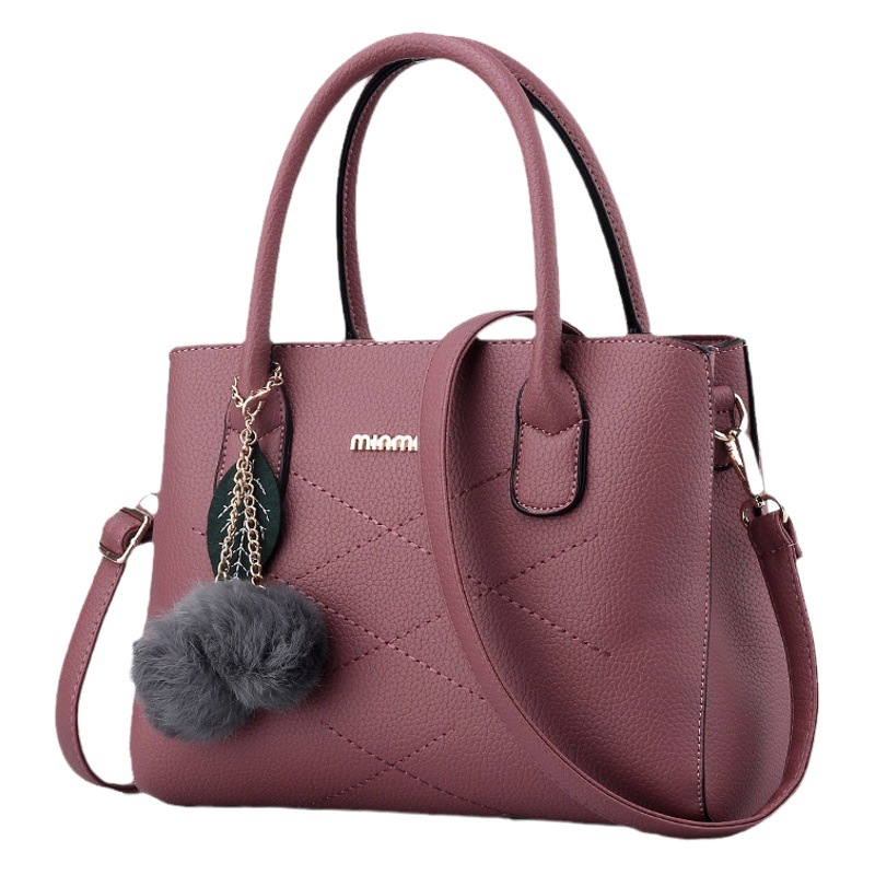 Primavera y verano nuevo bolso de estilo coreano Bolso grande elegante bolso de mujer de mediana edad bolso de la madre simple bolso de mensajero del hombro del todo fósforo moda