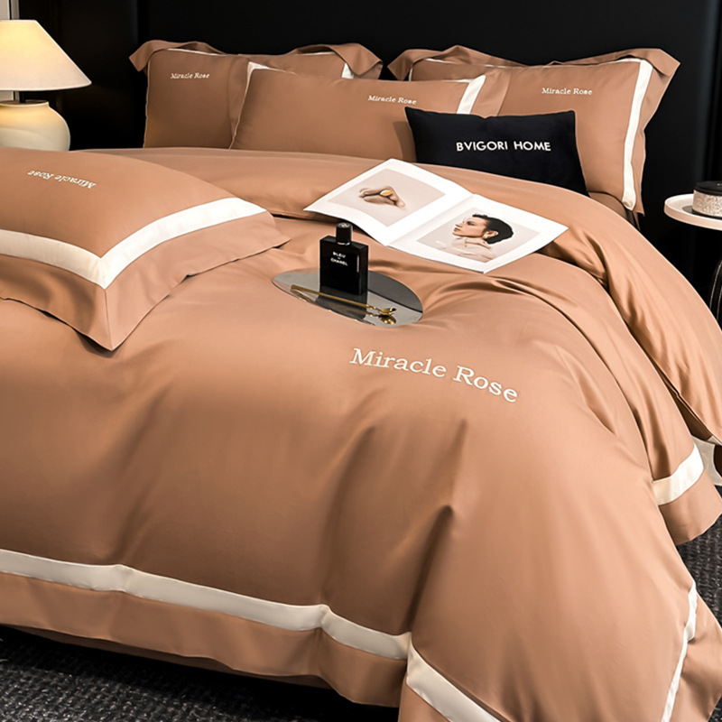 Cama de algodón de lujo ligero de alta gama de cuatro piezas de algodón 2025 nueva ropa de cama de tres piezas con funda de edredón de alta calidad