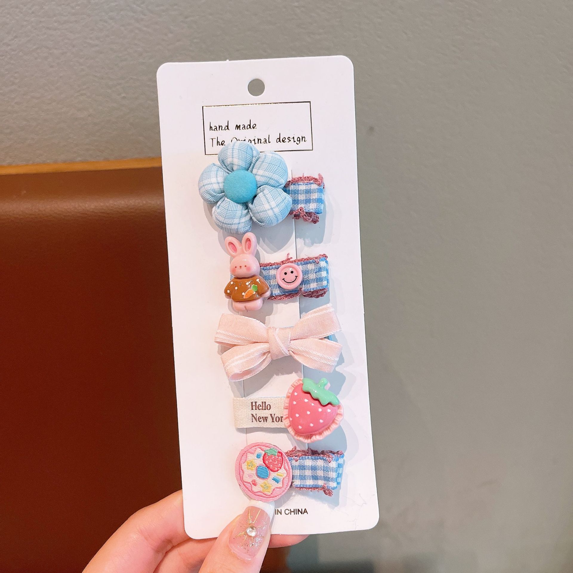 Nuevo pequeño botón de metal perfumado para niños anillo de cabello personalidad widgets niñas atar cabello cuerdas de cabello adornamientos para el cabello