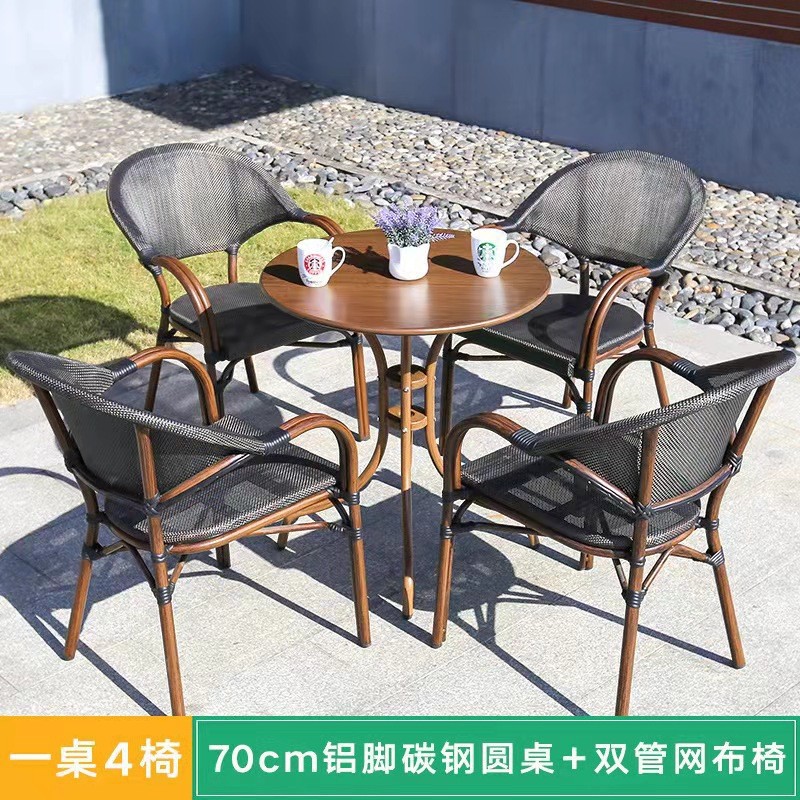 Mesa y silla al aire libre leche tienda de té cafetería silla de malla Silla de ratán Patio de tres piezas balcón mesa y silla de ocio al aire libre