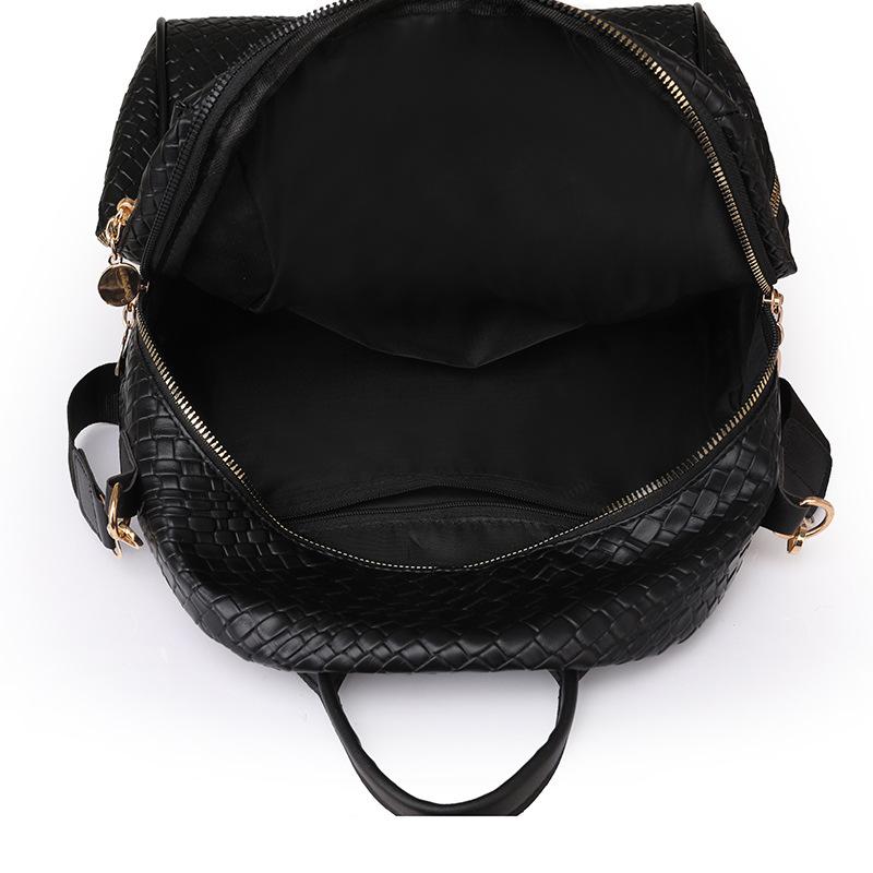 2024 exportación nueva mochila de cuero suave tejida para mujer moda y simple mochila de viaje al aire libre de doble uso marea