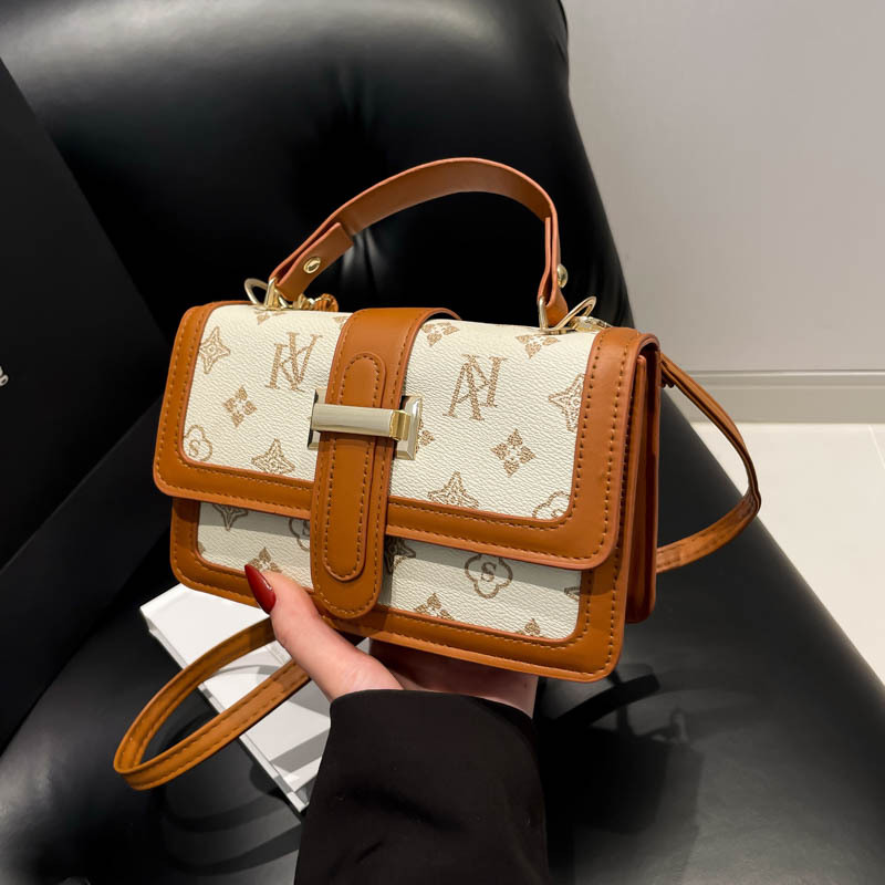 Vintage empalme este año popular bolso de mano para mujeres 2025 nueva moda impresión de letras de hombro mochila de moda