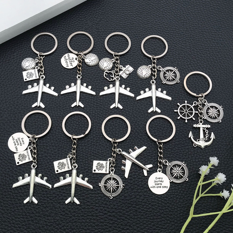 Foreign trade cross-border European and American travel aircraft no matter where globe pass key chain pendant Foreign trade cross-border European and American travel aircraft no matter where globe pass key chain pendant