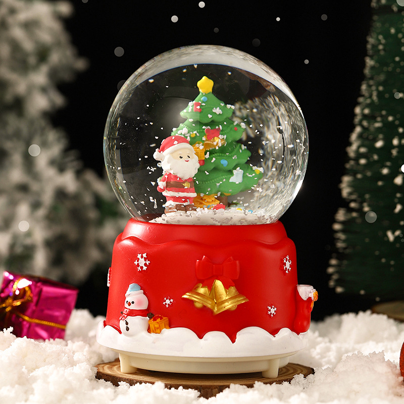 Una variedad de regalos de decoración de Navidad Navidad iluminante bola de cristal caja de música ventana diseño de velas lámparas de viento árbol de Navidad